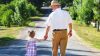 vatican news young girl takes walk with grandfather.jpeg